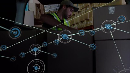 Sticker - Animation of network of connections with icons over caucasian male worker in warehouse