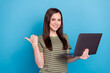 Leinwandbild Motiv Photo of hr millennial brunette lady hold laptop index promo wear striped t-shirt isolated on blue color background