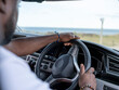 © Cultura Creative - Man driving van