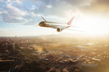 Commercial Plane Flying Over Urban Areas