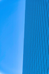 Wall Mural - Skyscraper building with a reflection of the sky on its glass walls- Austin, Texas