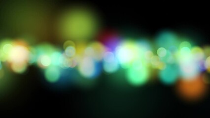 Wall Mural - seamless looping blurred circle bokeh motion on clean black animation background. copy space.