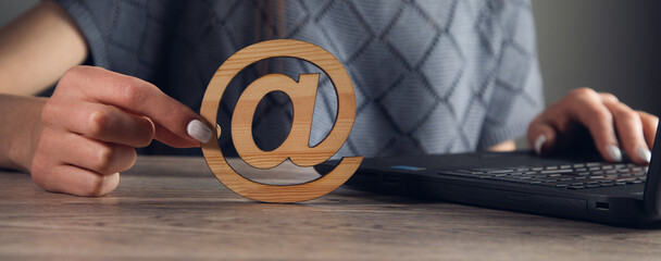 Sticker - woman working computer and hand wooden email