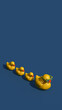 Rubber ducks in a row organization and leadership business concept. Vertical 3D illustration render.
