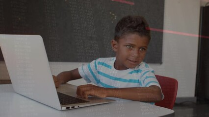 Sticker - Animation of data processing over african american boy using laptop in the class at school