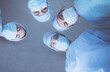 © lenets_tan - Team surgeon at work in operating room.