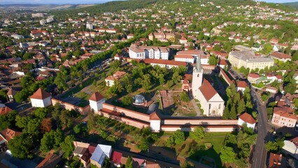 Wall Mural - Aerial drone view of Targu Mures Fortress in the city centre, Romania. Old buildings, greenery