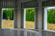 Old Wooden Antique Windows With Green Grass And Blue Sky