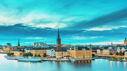 Canvas Print - Stockholm, Sweden. Scenic View Of Stockholm Skyline At Summer Evening. Famous Popular Destination Scenic Place In Dusk Lights. Riddarholm Church In Day To Night Transition Time Lapse.