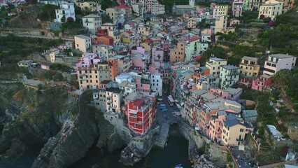 Wall Mural - View from above, stunning aerial view of Riomaggiore during a beautiful sunset. Riomaggiore is the most picturesque and the first village of the Cinque Terre coming from La Spezia, Liguria, Italy.	