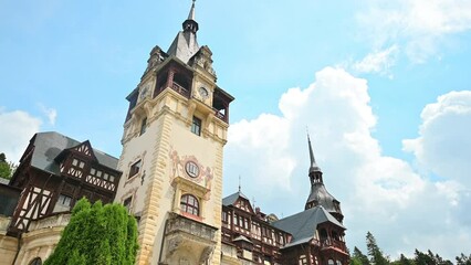 Wall Mural - View of The Peles Castle in Romania. Castle with gardens and statues