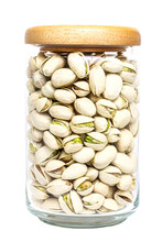 Organic Pistachio Nut Full Fill In Glass Bottle With Wood Cap On Transparent Background