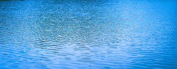 Wall Mural - blue background water surface