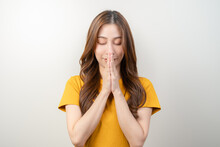 Young Woman Praying To Holy God Isolated On Background