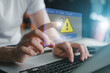 © Montri - Server Not Found Error Danger Caution Warning Concept. 404 Error Page Not Found. Businessman using computer laptop with triangle caution warning sing for notification error and maintenance concept.