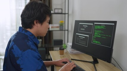 Asian man coding and programming on screen desktop. development web, hacker, developer concept.