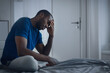 © Prostock-studio - Unhappy African American Man Suffering From Depression At Home