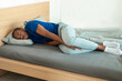 © Prostock-studio - African American Young Man Sleeping On Side Lying In Bedroom