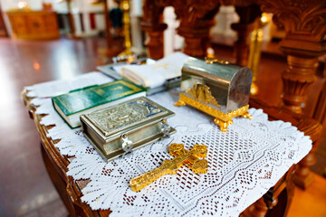 Sticker - a table with traditional items for orthodox baptism in the church.