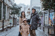 © Odua Images - portrait of asian family wearing warm clothing standing in the middle of snow fall in winter. family travel in turkey