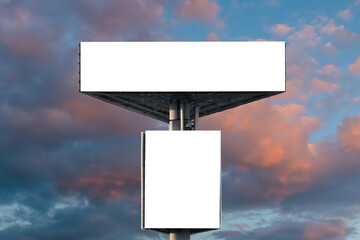 Wall Mural - two blank white billboards against warm sunset sky with clouds - mock up, front view. white screen, 