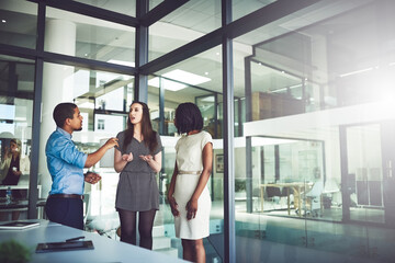 Wall Mural - Corporate, business and serious people discussing a strategy and talking about their company vision during a meeting in the boardroom. Teamwork and collaboration while sharing ideas