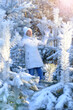 © aletia2011 - Happy beautiful senior woman posing in snowy winter park
