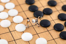 The Two Sides Fight Against Each Other On The Miniature Creative Chessboard