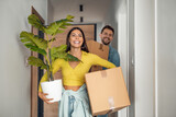 Fototapeta Panele - Young couple moving in new home