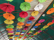 decoration made out of colorful hanging umbrellas 