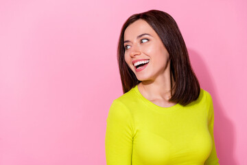 Wall Mural - Photo of cheerful satisfied person toothy smile laughing look empty space isolated on pink color background