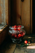 fresh red raspberries on a wooden windowsill