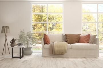 Stylish room in white color with sofa and autumn landscape in window. Scandinavian interior design. 3D illustration