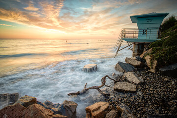 Wall Mural - Rushing waves hitting the shore in Encinitas CA