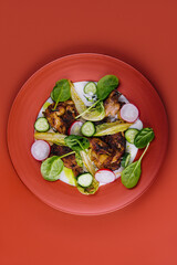 Wall Mural - Fried chicken thighs with vegetables in plate