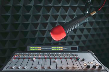 Professional microphone and sound mixer in radio station studio