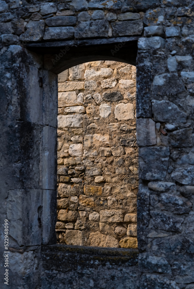 Empty window frame in the old town of Montclus sur Cèze in Provence ...