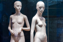 Naked Female Mannequins In The Shop Window. Fashion Clothing Woman Mannequin In The Store.
