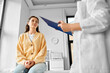 © Syda Productions - medicine, healthcare and people concept - female doctor with clipboard talking to woman patient at hospital