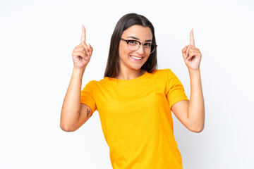 Young caucasian woman isolated on white background pointing up a great idea