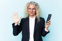 Middle Age Business Caucasian Woman Holding Mobile Phone Isolated On Blue Background Smiling Cheerful Showing Number Five With Fingers.