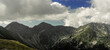 Three peaks of Rohace in the Slovak Tatras - nice clouds and sun in valley