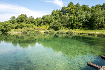 Canvas Print - Beautiful, turquoise coloured Korana river, flowing through the green forests of Lika, mountain region of Croatia near famous Plitvice lakes