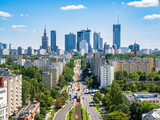 Fototapeta Góry - Skyscrapers in city center, Warsaw aerial landscape under blue sky