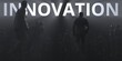 INNOVATION word and backlit anonymous crowd conceptual 3d rendering