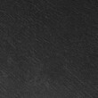 © peekeedee - Dark grey black slate background or texture.