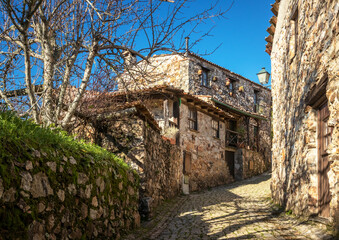 Wall Mural - Street view of the village of Casal de São Simão in Portugal, with beautiful stone houses.