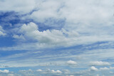 Fototapeta Niebo - Beautiful clouds during spring time in a Sunny day. Blue sky and white fluffy clouds