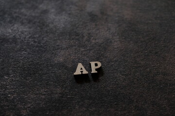 Wall Mural - The letters A and P above the dark field. Initials AP