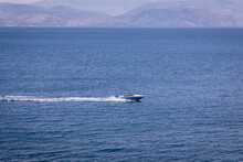 Powerboat Seen From Mon Repos Park In Corfu Town, Corfu Island, Greece